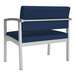 A Lesro Lenox bariatric guest chair with blue vinyl and silver legs.