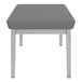 A Lesro Lenox steel bench with grey fabric and white legs.