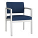 A blue Lesro guest chair with white legs.