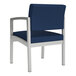 A Lesro Lenox Imperial Blue vinyl guest chair with silver legs.