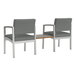 Two Lesro Lenox steel arm chairs with grey upholstered seats and a metal frame with a Sarum Twill laminate connecting table.