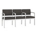 A Lesro Lenox steel sofa with charcoal vinyl and center arms.