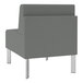 A Lesro Luxe Lounge Series grey fabric guest chair with steel legs.