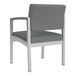 A Lesro Lenox grey fabric guest chair with metal legs.