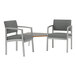 Two grey Lesro Lenox arm chairs with a connecting table.
