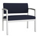 A navy blue and white Lesro Lenox bariatric guest chair with a white frame.