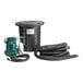 A black Zoeller crawl space sump with a green pump and hose.