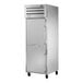 A silver True Spec Series reach-in refrigerator with a white door and a handle on wheels.