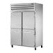 A white True Spec Series reach-in refrigerator with two solid half doors and silver handles.