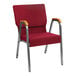 A red and silver Flash Furniture church chair with wood accent arms.