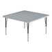 A square gray high-pressure laminate activity table with black legs.