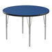 A blue Correll round activity table with silver legs.