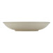 A white porcelain deep coupe plate with a rim on a white background.