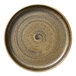 A brown porcelain plate with raised rim and swirls on it.