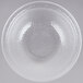 A clear glass bowl with a textured surface.