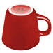 A red Tuxton Colorado tall cup with a handle.
