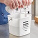A white 3-quart sanitizing pail labeled 'Sanitizer' with a metal handle.