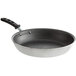 A Vollrath Wear-Ever black frying pan with a white background.
