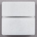 An American Metalcraft white marble rectangular card holder with black lines on two sides.