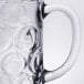 A clear Libbey glass mug with a handle.