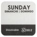 A white and black square label with black text that says "Sunday" on it.