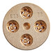 A circular gold metal disc with holes in it.