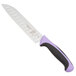 A Mercer Culinary Millennia Colors Santoku knife with a purple handle.