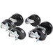 A set of six Traulsen casters with black rubber wheels and silver swivel mounts.