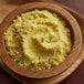 A bowl of Regal Chicken Soup Base, a yellow powder.