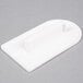 A white plastic Ateco fondant smoother with a rectangular handle.