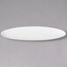 A white oval porcelain leaf platter with a long edge.