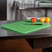 San Jamar CB152012GN Cut-N-Carry® 20" x 15" x 1/2" Green Cutting Board with Hook Main Thumbnail 1