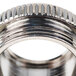 A close-up of a metal self-closing index ring.
