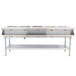 An Eagle Group stainless steel gas steam table with sealed wells holding hot food.