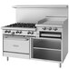 A large stainless steel Garland commercial gas range with a convection oven.