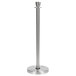 A stainless steel pole with a round metal base.