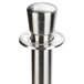 A stainless steel metal pole with a round knob on top.