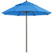 A blue Grosfillex Windmaster umbrella with a white pole.