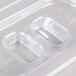 A clear plastic Vollrath 1/9 size pan lid.