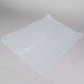 A roll of white plastic Inteplast Group half size bun pan covers.