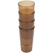 A stack of brown plastic Cambro tumblers.