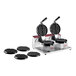 A Estella double Belgian waffle maker with bubble waffle plates on a counter with waffles on top.