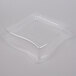 A clear square container with a curved edge.
