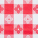 A red and white checkered tablecloth with a flannel back.