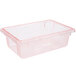 A Carlisle red plastic food storage box with a lid with a red trim.