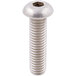 A white screw with a nut on a table.