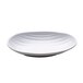 A white Elite Global Solutions deep oval plate with wavy lines on it.