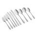 A close-up of a group of Acopa Josette stainless steel forks.