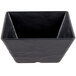 An American Metalcraft black square melamine bowl with a white border.