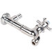 A chrome plated T&S wall-mount faucet with a four arm handle.